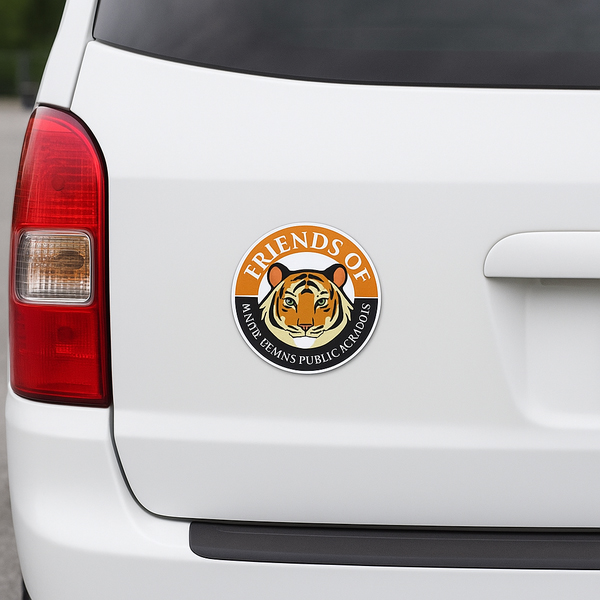 Custom round car magnet with tiger mascot displayed on white SUV.